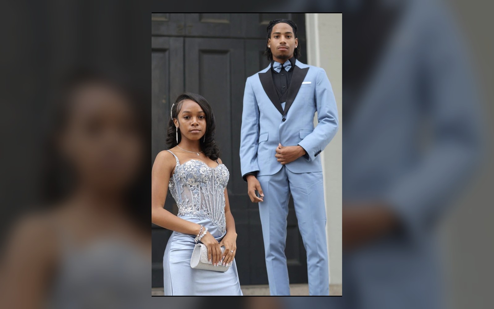 Formal event portrait of a couple in coordinated blue attire