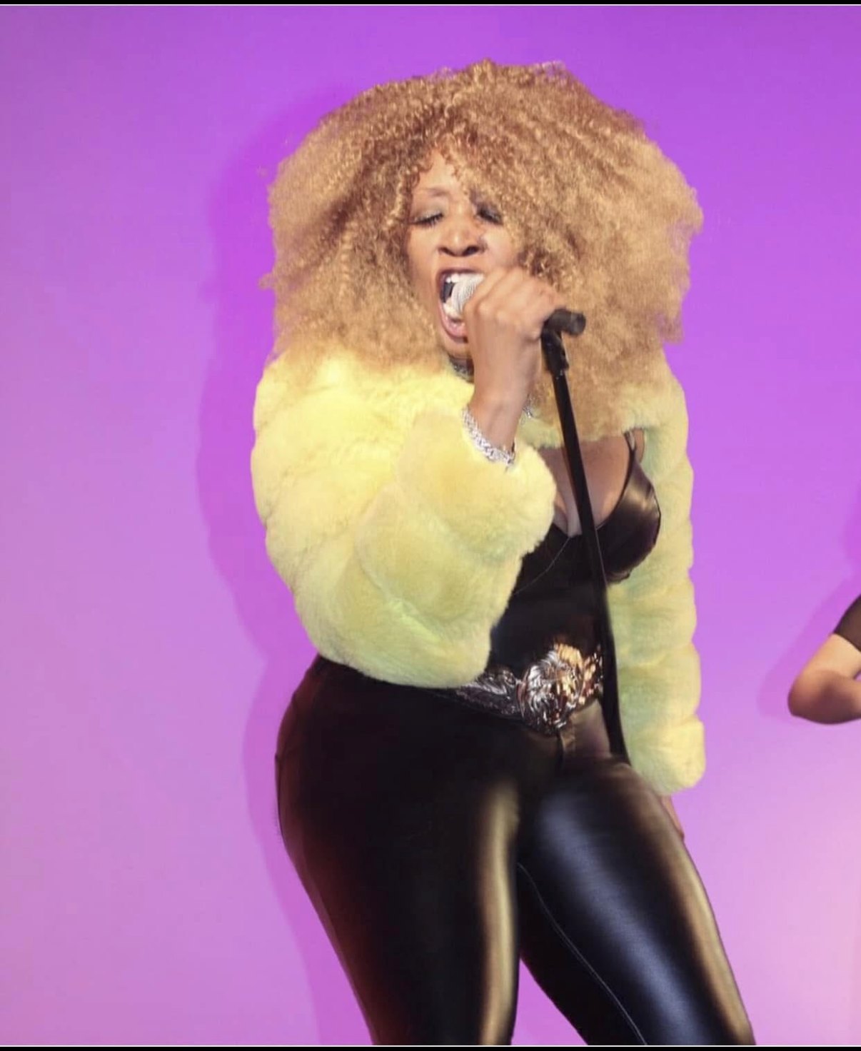 Live performer photographed on stage